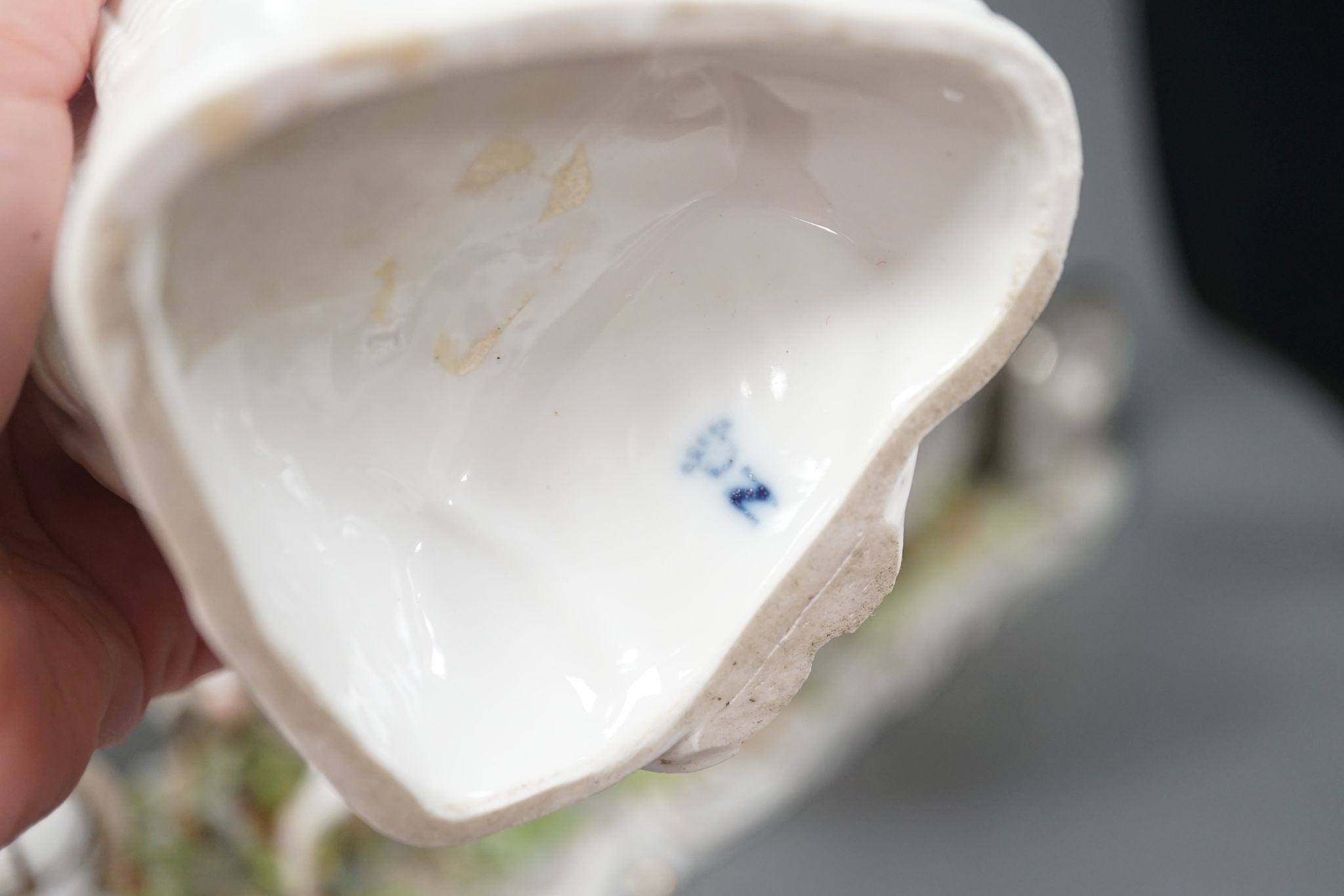 A large Italian porcelain carriage group and a pair of Italian white porcelain figure of a lady and a man 54cm